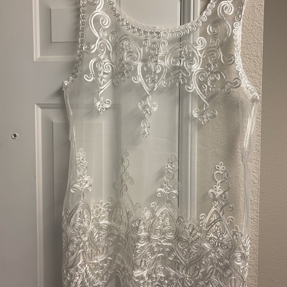 Sheer top. Lots of detail